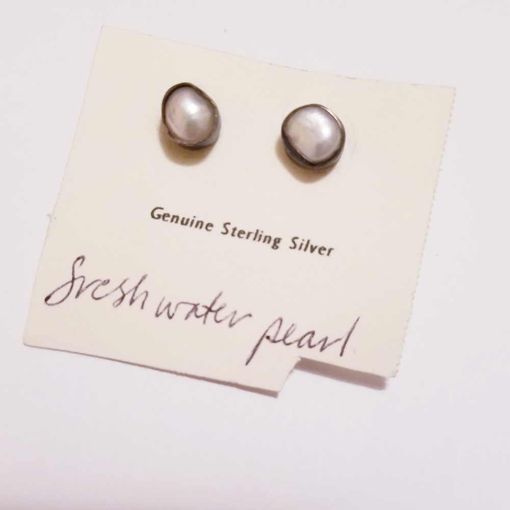 Freshwater pearl earrings set in sterling silver